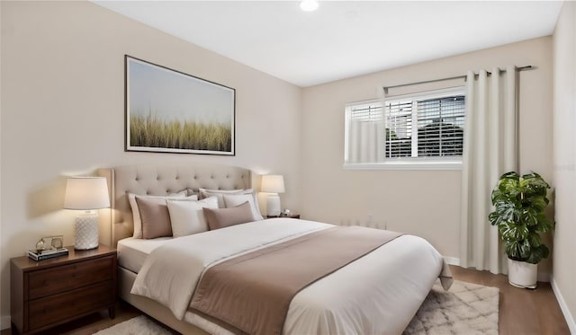 1695 Lee Rd Unit E103, Winter Park, FL 32789 - bedroom with wood finished floors and baseboards