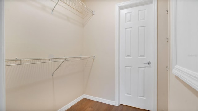 1695 Lee Rd Unit E103, Winter Park, FL 32789 - spacious closet featuring wood finished floors