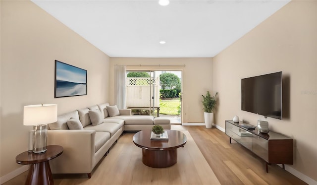 1695 Lee Rd Unit E103, Winter Park, FL 32789 - living room with baseboards, light wood finished floors, and recessed lighting