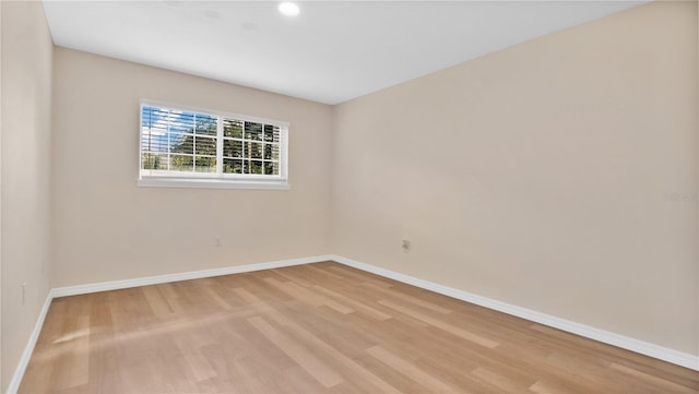 1695 Lee Rd Unit E103, Winter Park, FL 32789 - unfurnished room with baseboards, light wood-style flooring, and recessed lighting