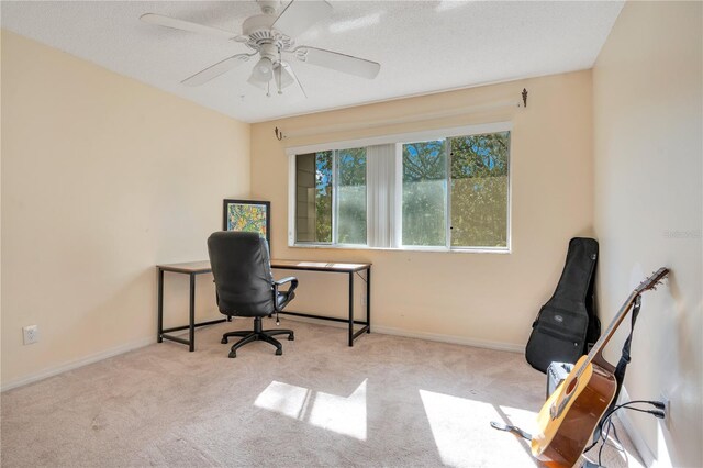 406 Oak Haven Dr Unit 406, Altamonte Springs, FL 32701 - home office with a ceiling fan, light carpet, a textured ceiling, and baseboards