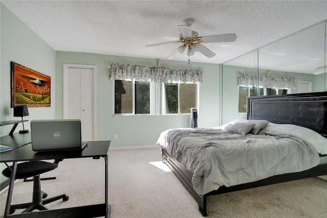 406 Oak Haven Dr Unit 406, Altamonte Springs, FL 32701 - carpeted bedroom featuring a textured ceiling, ceiling fan, and baseboards