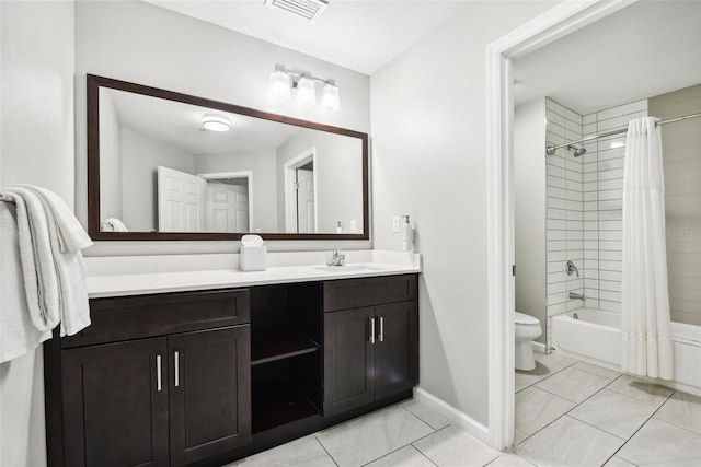 full bathroom featuring toilet, visible vents, baseboards, vanity, and shower / tub combo with curtain