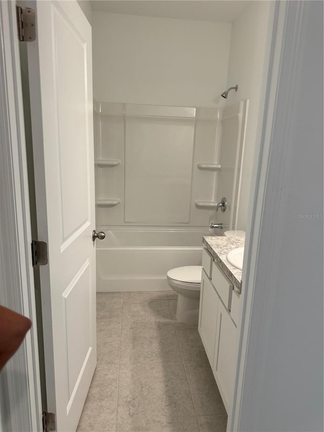 full bathroom with toilet, tile patterned floors, shower / bathing tub combination, and vanity