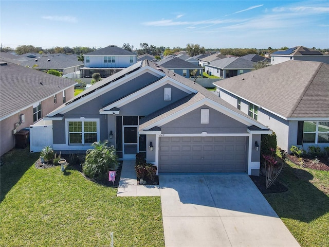 649 Meadow Pointe Dr, Haines City, FL 33844 - view of front facade with a residential view, stucco siding, driveway, and a front lawn
