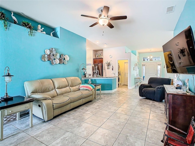 649 Meadow Pointe Dr, Haines City, FL 33844 - living area with light tile patterned floors, visible vents, baseboards, and a ceiling fan