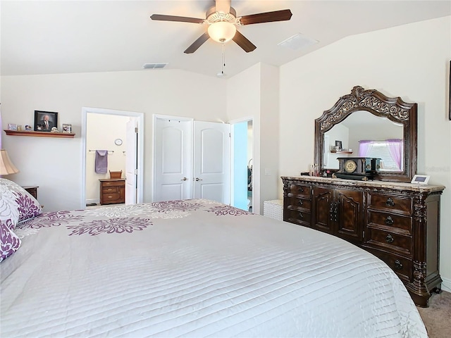 649 Meadow Pointe Dr, Haines City, FL 33844 - carpeted bedroom with visible vents, ceiling fan, ensuite bathroom, and lofted ceiling