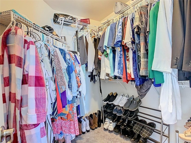 649 Meadow Pointe Dr, Haines City, FL 33844 - walk in closet featuring carpet floors
