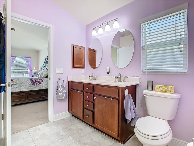 649 Meadow Pointe Dr, Haines City, FL 33844 - bathroom with ensuite bath, toilet, double vanity, and a sink