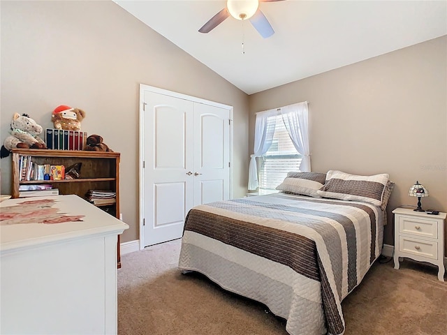 649 Meadow Pointe Dr, Haines City, FL 33844 - bedroom featuring a closet, light carpet, lofted ceiling, and a ceiling fan