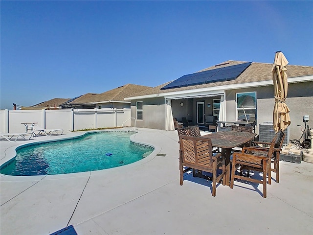 649 Meadow Pointe Dr, Haines City, FL 33844 - view of pool with a fenced in pool, a fenced backyard, outdoor dining space, and a patio area