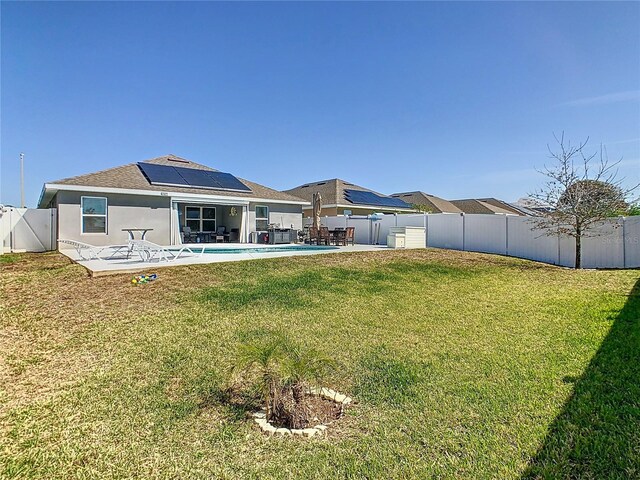 649 Meadow Pointe Dr, Haines City, FL 33844 - view of yard with a patio, a fenced backyard, and a fenced in pool