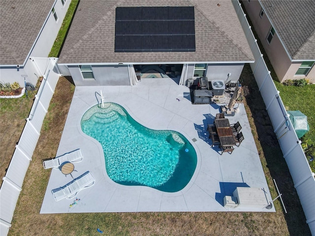 649 Meadow Pointe Dr, Haines City, FL 33844 - view of pool featuring outdoor dining space, a fenced in pool, a patio, and a fenced backyard