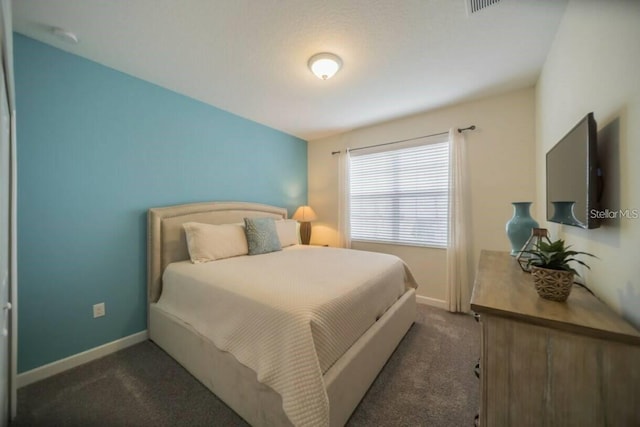 1646 Moon Valley Dr, Davenport, FL 33896 - bedroom with carpet floors and baseboards