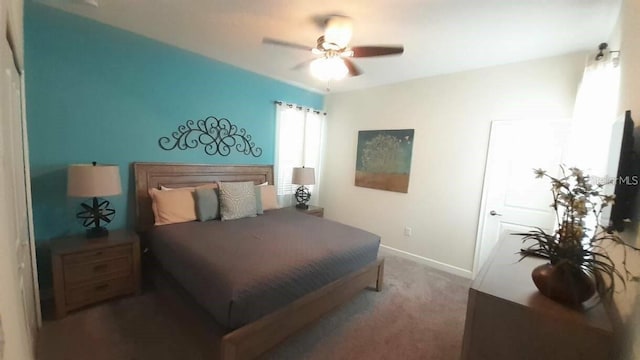 1646 Moon Valley Dr, Davenport, FL 33896 - carpeted bedroom featuring a ceiling fan and baseboards