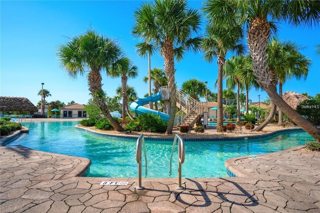 1646 Moon Valley Dr, Davenport, FL 33896 - community pool featuring a water slide