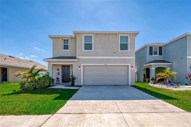 traditional home with an attached garage, driveway, a front lawn, and stucco siding