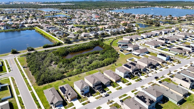 aerial view featuring a water view and a residential view