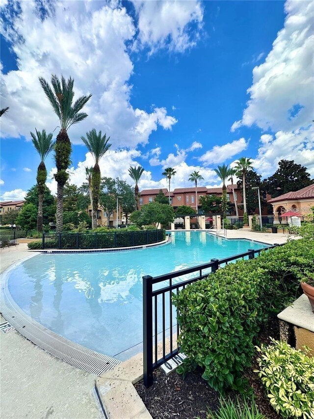 pool featuring fence