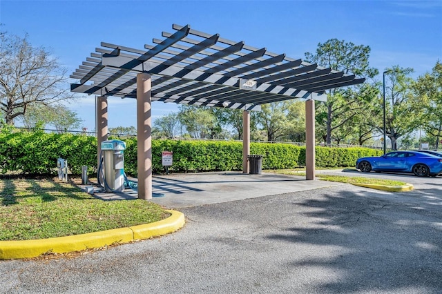 view of partially covered parking lot