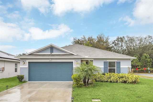 ranch-style home with concrete driveway, a front lawn, and stucco siding