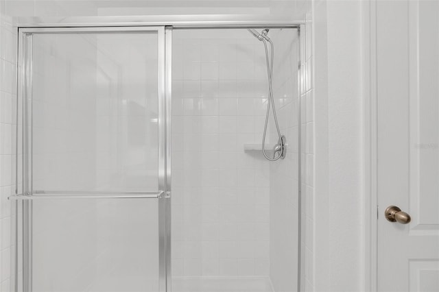 bathroom featuring a stall shower