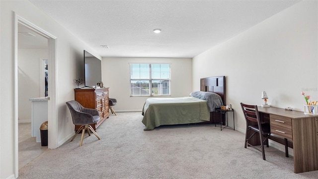 bedroom featuring carpet floors, baseboards, and visible vents