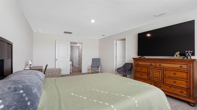 bedroom with light carpet and visible vents