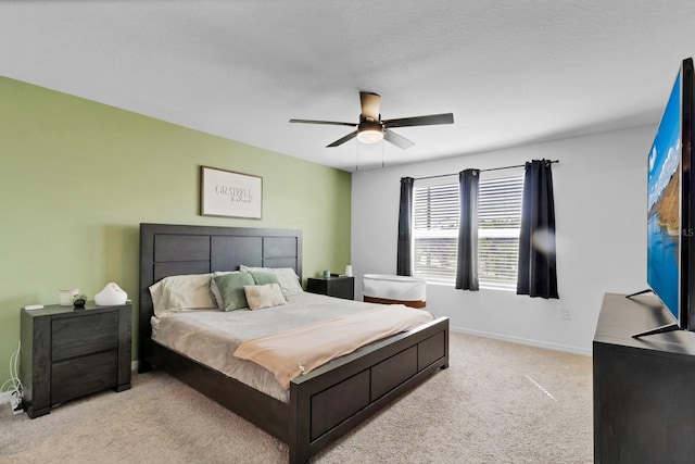 4544 Teoli Ct, Kissimmee, FL 34746 - bedroom with light carpet, ceiling fan, and baseboards