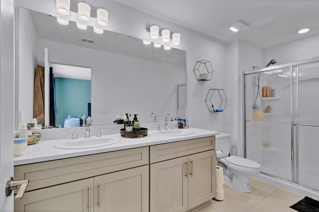 4544 Teoli Ct, Kissimmee, FL 34746 - ensuite bathroom featuring tile patterned floors, visible vents, a sink, and ensuite bathroom