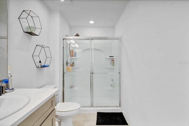4544 Teoli Ct, Kissimmee, FL 34746 - bathroom with tile patterned flooring, vanity, toilet, and a shower stall
