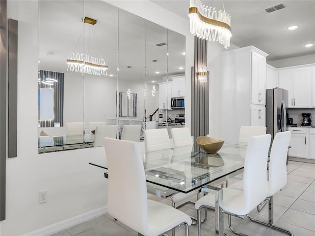 dining area with recessed lighting, visible vents, an inviting chandelier, and light tile patterned floors