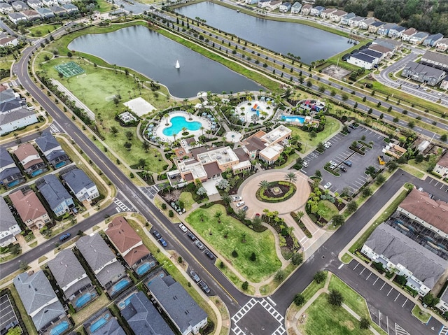 aerial view featuring a water view and a residential view