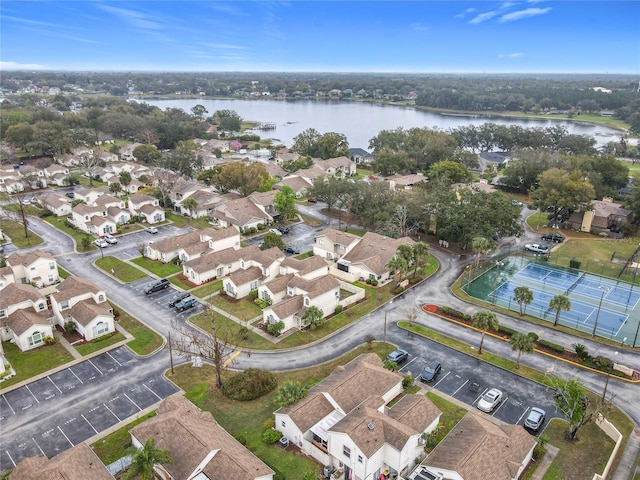 bird's eye view with a residential view and a water view