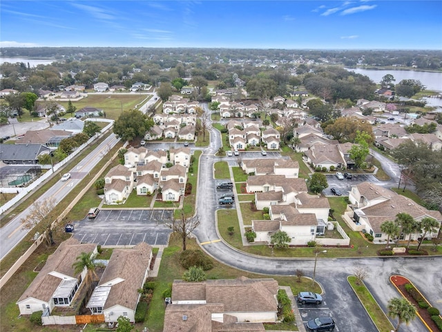 aerial view featuring a residential view and a water view