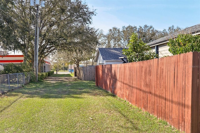 view of yard with fence