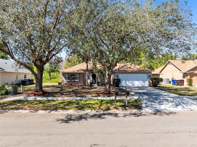 view of front of house with driveway and an attached garage