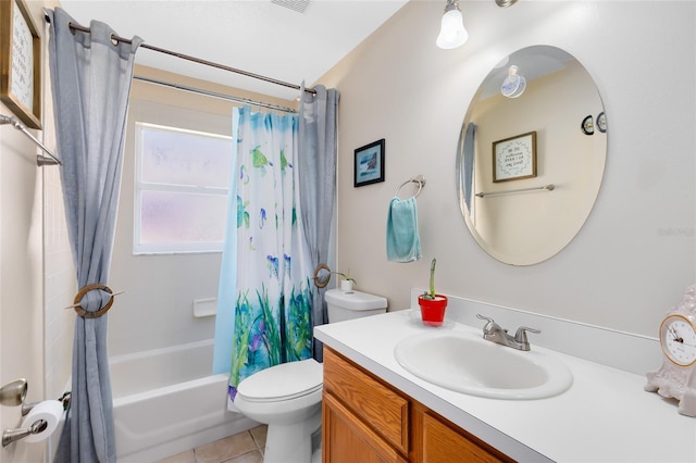 4222 Gold Rush Ln, Saint Cloud, FL 34772 - bathroom featuring shower / bath combo with shower curtain, tile patterned flooring, vanity, and toilet