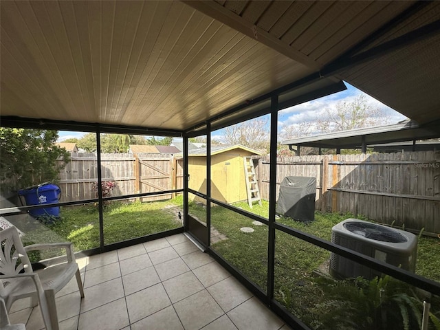 unfurnished sunroom featuring wooden ceiling