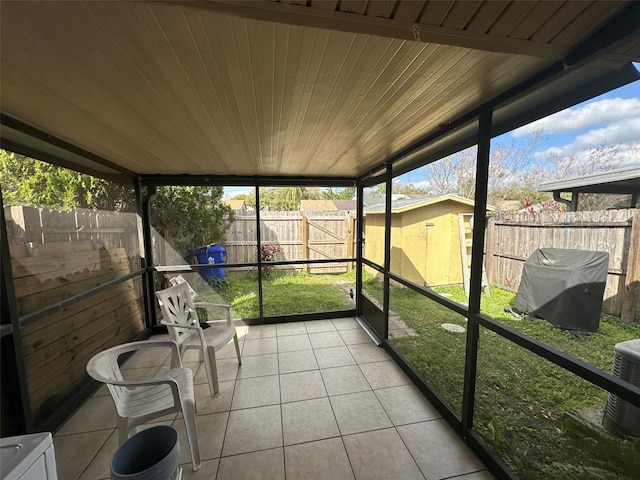 sunroom / solarium with wooden ceiling