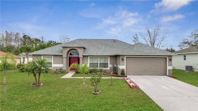 ranch-style home featuring cooling unit, a front lawn, and stucco siding