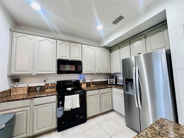 kitchen with recessed lighting, visible vents, light tile patterned flooring, white cabinetry, and black appliances