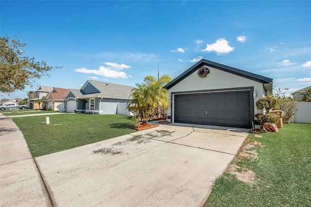 ranch-style home with a garage, fence, a front lawn, and stucco siding