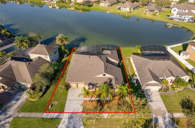 aerial view with a residential view and a water view