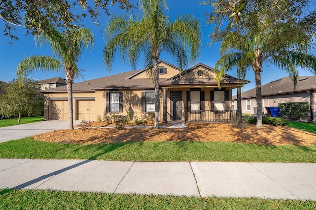 single story home with concrete driveway, an attached garage, and stucco siding