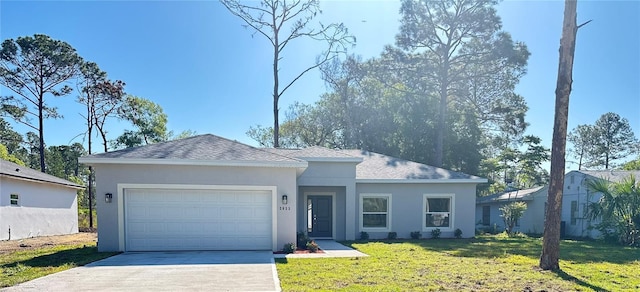 single story home featuring stucco siding, a front lawn, a garage, and concrete driveway