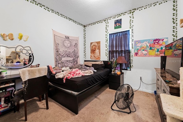 bedroom featuring carpet flooring, a textured ceiling, and baseboards