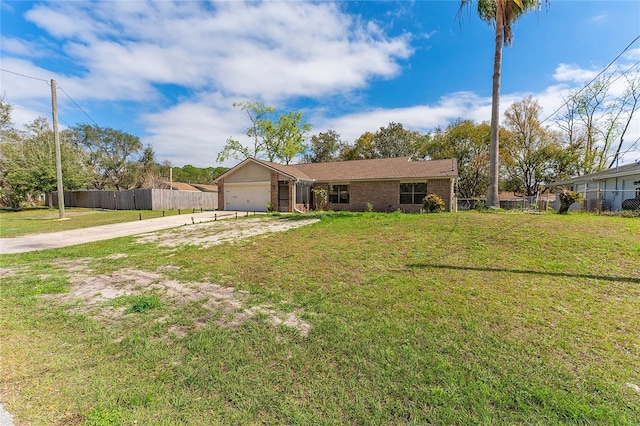 single story home with a garage, driveway, a front lawn, and fence