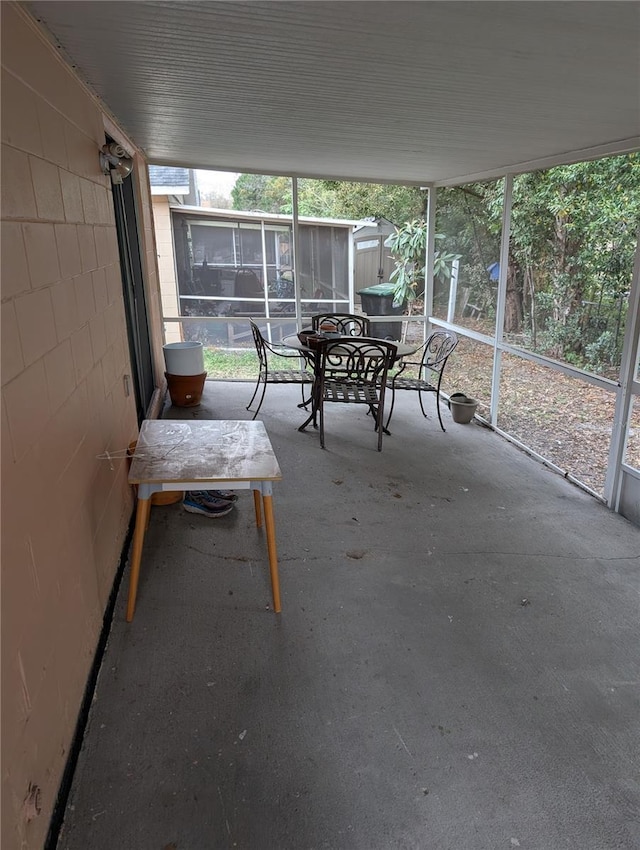 unfurnished sunroom with a healthy amount of sunlight