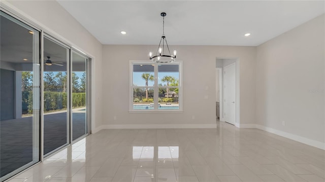 unfurnished room with recessed lighting, ceiling fan with notable chandelier, baseboards, and light tile patterned floors